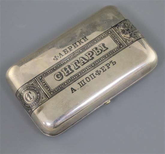 A late 19th century Russian 84 zolotnik silver and niello cigarette case, decorated with band in cyrillic, gross 180 grams.